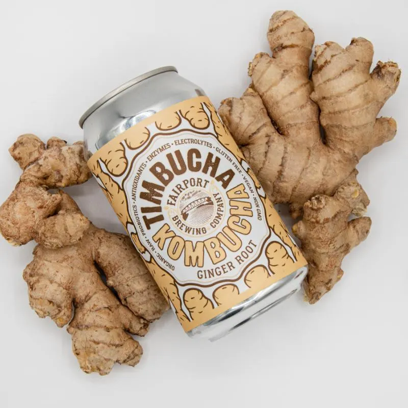A can of Ginger Root lying on fresh ginger